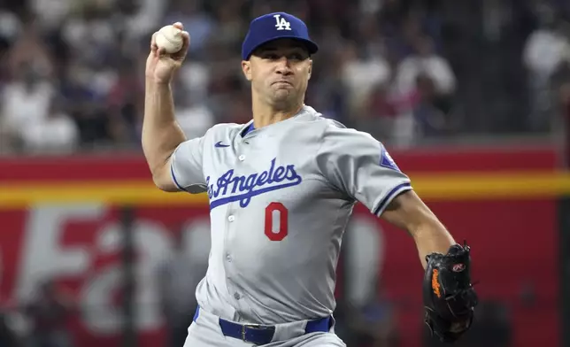 Los Angeles Dodgers pitcher Jack Flaherty throws against the Arizona Diamondbacks in the third inning during a baseball game, Monday, Sept. 2, 2024, in Phoenix. (AP Photo/Rick Scuteri)