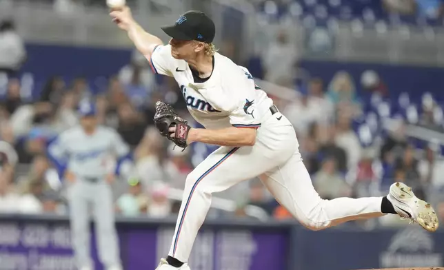 Miami Marlins starting pitcher Darren McCaughan aims a pitch during the first inning of a baseball game against the Los Angeles Dodgers, Tuesday, Sept. 17, 2024, in Miami. (AP Photo/Marta Lavandier)