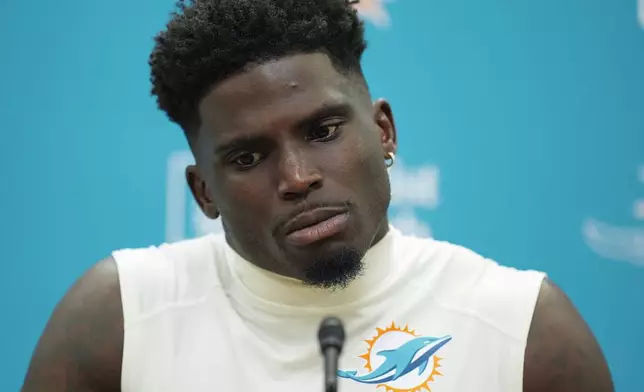 Miami Dolphins wide receiver Tyreek Hill speaks to journalists following a team practice, Wednesday, Sept. 11, 2024, in Miami Gardens, Fla. (AP Photo/Rebecca Blackwell)