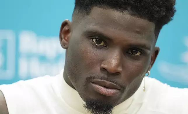 Miami Dolphins wide receiver Tyreek Hill speaks to journalists following a team practice, Wednesday, Sept. 11, 2024, in Miami Gardens, Fla. (AP Photo/Rebecca Blackwell)