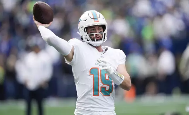 Miami Dolphins quarterback Skylar Thompson warms up before an NFL football game against the Seattle Seahawks, Sunday, Sept. 22, 2024, in Seattle. (AP Photo/Stephen Brashear)