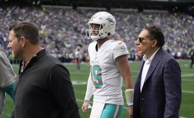 Miami Dolphins quarterback Skylar Thompson (19) leaves the field during the second half of an NFL football game against the Seattle Seahawks, Sunday, Sept. 22, 2024, in Seattle. (AP Photo/Stephen Brashear)