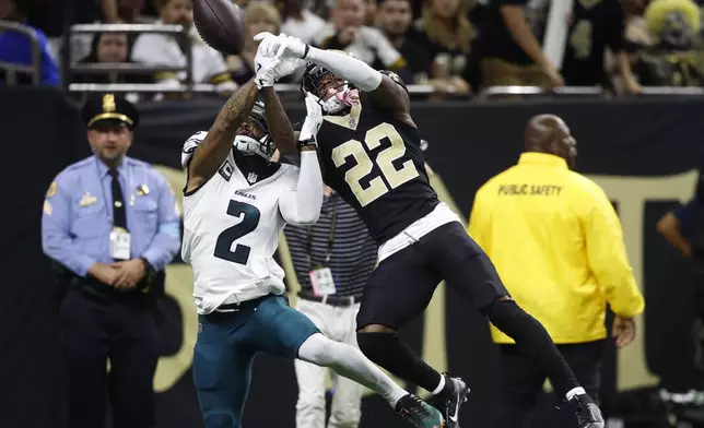 Philadelphia Eagles cornerback Darius Slay Jr. (2) breaks up a pass intended for New Orleans Saints wide receiver Rashid Shaheed (22) in the second half of an NFL football game in New Orleans, Sunday, Sept. 22, 2024.. (AP Photo/Butch Dill)