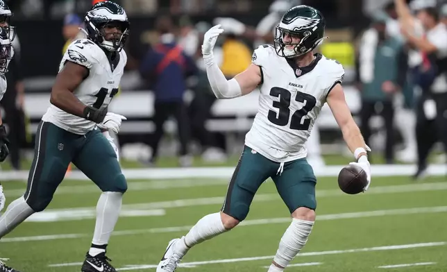 Philadelphia Eagles safety Reed Blankenship (32) celebrates his interception that ended the New Orleans Saints' final drive in the fourth quarter of an NFL football game in New Orleans, Sunday, Sept. 22, 2024. (AP Photo/Gerald Herbert)