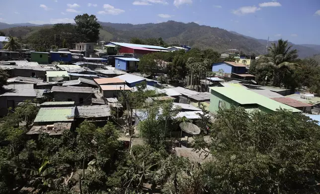 Shanties crowd a locality in Dili, East Timor on Friday, Sept. 6, 2024. (AP Photo/Firdia Lisnawati)