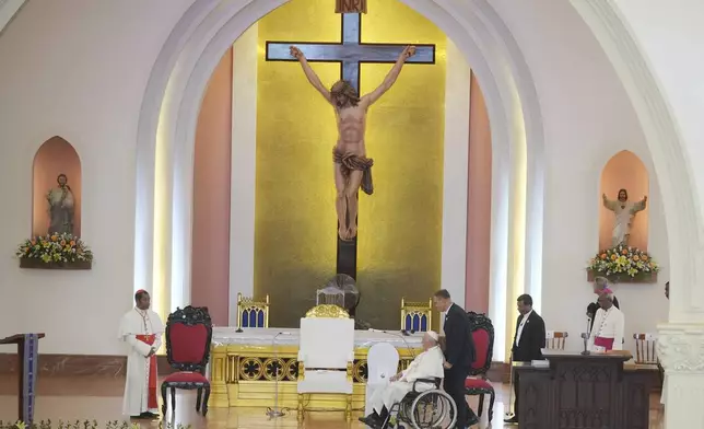 Pope Francis arrives to lead the holy mass at the Cathedral of the Immaculate Conception in Dili, East Timor, Tuesday, Sept. 10, 2024. (AP Photo/Dita Alangkara)