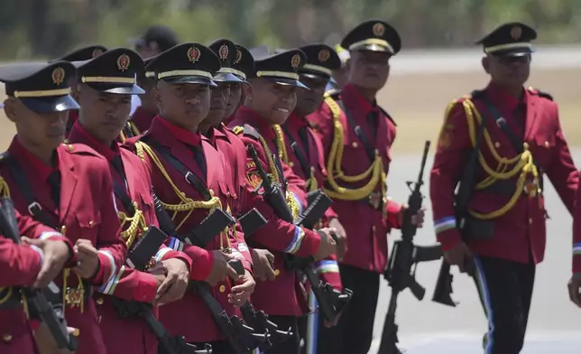 The honor guard await the arrival of Pope Francis at Dili Presidente Nicolau Lobato International Airport in Dili, East Timor, Monday, Sept. 9, 2024. (AP Photo/Dita Alangkara)