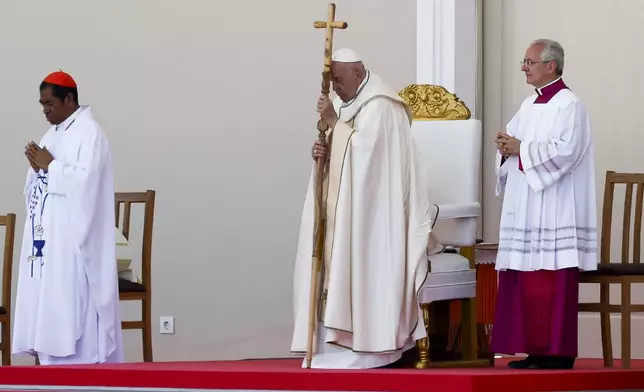 Pope Francis attends the Holy Mass at the Esplanade of Taci Tolu during his apostolic trip to Asia, in Dili, East Timor, Tuesday, Sept. 10, 2024. (Willy Kurniawan/Pool Photo via AP)