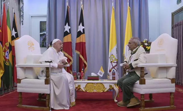 Pope Francis meets with East Timor's President Jose Ramos-Horta, right, at the Presidential Palace in Dili, East Timor, Monday, Sept. 9, 2024. (Tiziana Fabi/Pool Photo via AP)