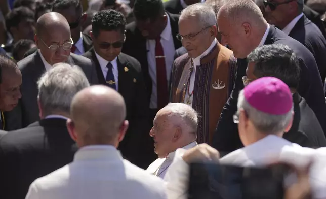 Pope Francis is greeted by East Timor's President Jose Ramos Horta during a welcoming ceremony at Dili Presidente Nicolau Lobato International Airport in Dili, East Timor, Monday, Sept. 9, 2024. (AP Photo/Dita Alangkara)