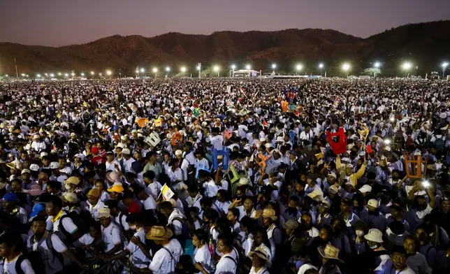 Faithful gather at the Esplanade of Taci Tolu during Pope Francis' apostolic trip to Asia, in Dili, East Timor, Tuesday, Sept. 10, 2024. (Willy Kurniawan/Pool Photo via AP)