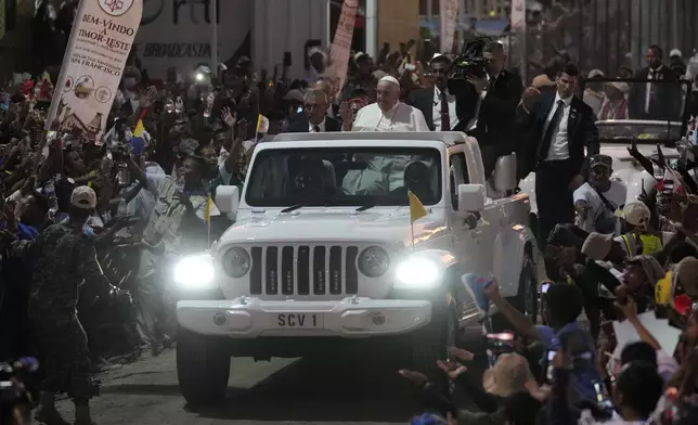 Pope Francis leaves after leading a holy mass at Tasitolu park in Dili, East Timor, Tuesday, Sept. 10, 2024. (AP Photo/Dita Alangkara, Pool)