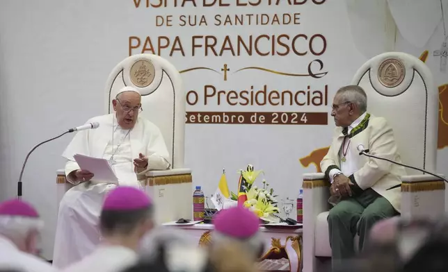 East Timor President Jose Ramos-Horta, right, listens as Pope Francis speaks at the Presidential Palace in Dili, East Timor, Monday, Sept. 9, 2024. (AP Photo/Dita Alangkara, Pool)