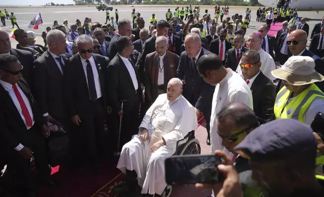 Pope Francis arrives at Dili Presidente Nicolau Lobato International Airport in Dili, East Timor, Monday, Sept. 9, 2024. (AP Photo/Dita Alangkara)