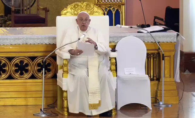 Pope Francis leads the holy mass at the Cathedral of the Immaculate Conception in Dili, East Timor, Tuesday, Sept. 10, 2024. (AP Photo/Dita Alangkara)