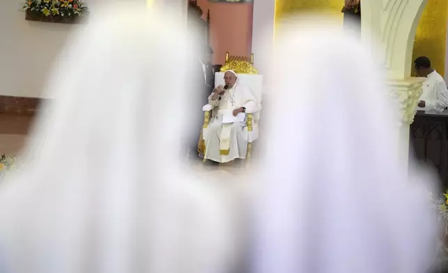 Pope Francis leads the holy mass at the Cathedral of the Immaculate Conception in Dili, East Timor, Tuesday, Sept. 10, 2024. (AP Photo/Dita Alangkara)