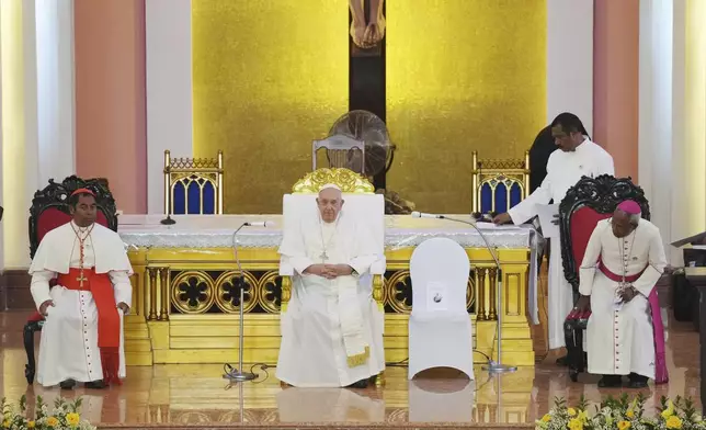 Pope Francis leads the holy mass at the Cathedral of the Immaculate Conception in Dili, East Timor, Tuesday, Sept. 10, 2024. (AP Photo/Dita Alangkara)