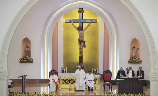 Pope Francis leads the holy mass at the Cathedral of the Immaculate Conception in Dili, East Timor, Tuesday, Sept. 10, 2024. (AP Photo/Dita Alangkara)