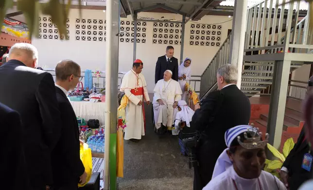 Pope Francis arrives at the 'Irmas ALMA' (Sisters of the Association of Lay Missionaries) School for Children with Disabilities in Dili, East Timor, Tuesday, Sept. 10, 2024. Pope Francis has indirectly acknowledged the abuse scandal in East Timor involving its Nobel Peace Prize-winning independence hero Bishop Carlos Filipe Ximenes Belo. "Let us also not forget that these children and adolescents have their dignity violated," Francis said. "In response, we are all called to do everything possible to prevent every kind of abuse and guarantee a healthy and peaceful childhood for all young people." (AP Photo/Gregorio Borgia)