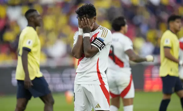 Peru's Renato Tapia, reacts after fails an opportunity to scores during a qualifying soccer match against Ecuador for the FIFA World Cup 2026 at Rodrigo Paz Delgado stadium in Quito, Ecuador, Tuesday, Sept. 10, 2024. (AP Photo/Dolores Ochoa)