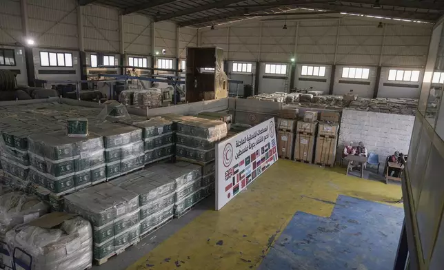 Humanitarian aids are seen at the logistic center near the Rafah border crossing between Egypt and the Gaza Strip, Monday, Sept. 9, 2024. (AP Photo/Amr Nabil)