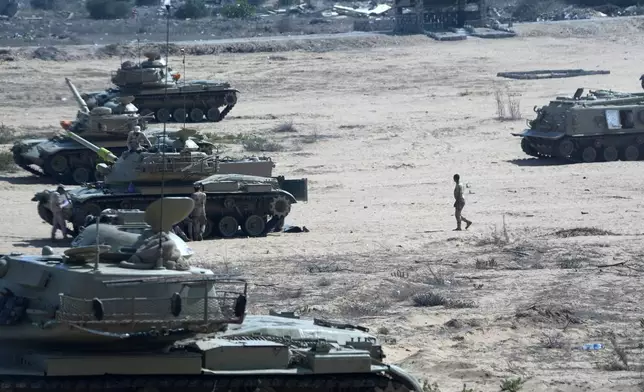 Egyptian tanks stand alert near the Rafah border crossing between Egypt and the Gaza Strip, Monday, Sept. 9, 2024. (AP Photo/Amr Nabil)