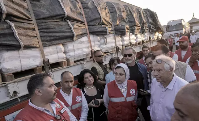 European Union foreign policy chief Josep Borrell checks humanitarian aids at the logistic center near the Rafah border crossing between Egypt and the Gaza Strip, Monday, Sept. 9, 2024. (AP Photo/Amr Nabil)