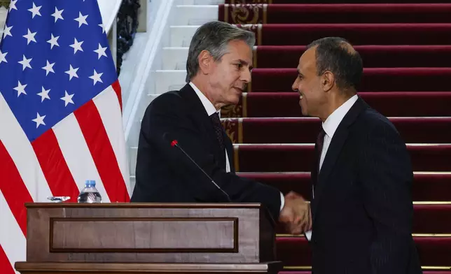 U.S. Secretary of State Antony Blinken shakes hands with Egypt's Foreign Minister Badr Abdelatty during a joint press conference in Tahrir Palace in Cairo, Egypt Wednesday, Sept. 18, 2024. (Evelyn Hockstein/Pool Photo via AP)