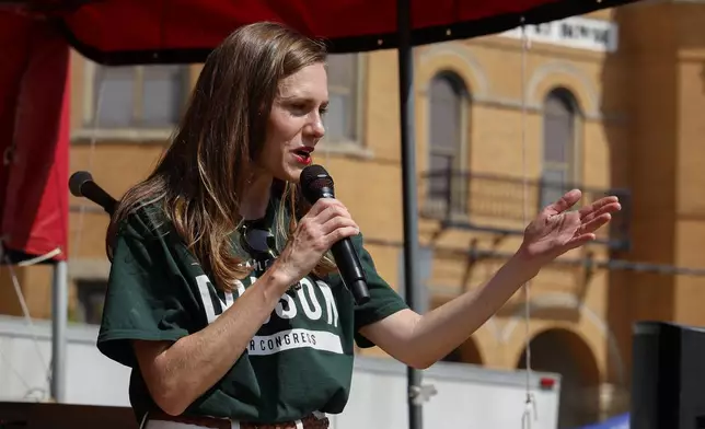 Alabama's new 2nd Congressional District Republican candidate Caroleene Dobson speaks during the Macon County Day Festival in Tuskegee, Ala., on Saturday, Aug 31, 2024. (AP Photo/ Butch Dill)