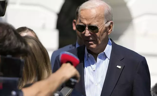 President Joe Biden talks with reporters as he walks out of the White House to board Marine One on the South Lawn in Washington, Monday, Sept. 2, 2024, for a trip to a campaign event with Democratic presidential nominee Vice President Kamala Harris in Pittsburgh. (AP Photo/Mark Schiefelbein)