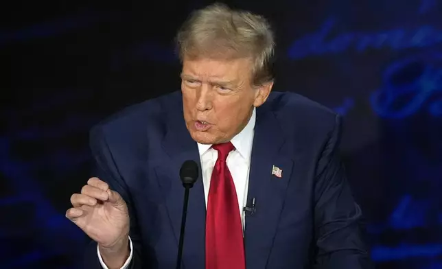 Republican presidential nominee former President Donald Trump speaks during a presidential debate with Democratic presidential nominee Vice President Kamala Harris at the National Constitution Center, Tuesday, Sept.10, 2024, in Philadelphia. (AP Photo/Alex Brandon)'