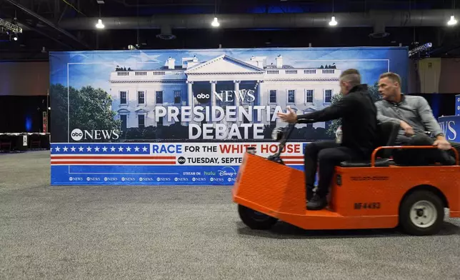 Signage at the media filing center ahead of the presidential debate between Republican presidential candidate former President Donald Trump and Democratic presidential nominee Vice President Kamala Harris, Monday, Sept. 9, 2024, in Philadelphia. (AP Photo/Pablo Martinez Monsivais)