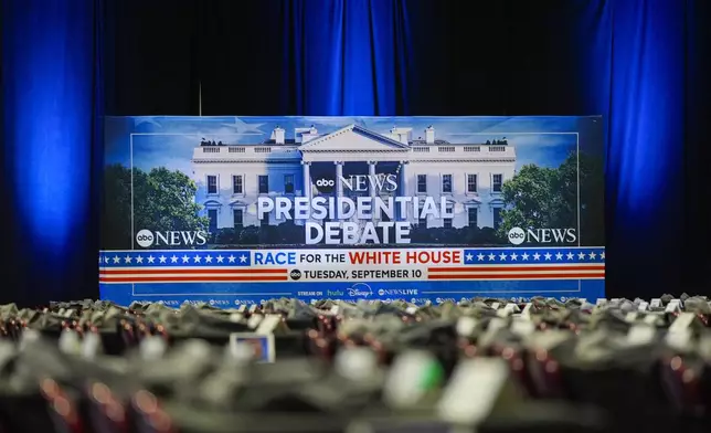 Signage at the media filing center ahead of the presidential debate between Republican presidential candidate former President Donald Trump and Democratic presidential nominee Vice President Kamala Harris, Monday, Sept. 9, 2024, in Philadelphia. (AP Photo/Pablo Martinez Monsivais)