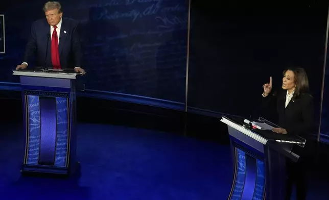 Republican presidential nominee former President Donald Trump and Democratic presidential nominee Vice President Kamala Harris participate during an ABC News presidential debate at the National Constitution Center, Tuesday, Sept.10, 2024, in Philadelphia. (AP Photo/Alex Brandon)