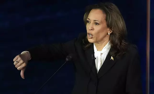 Democratic presidential nominee Vice President Kamala Harris gestures as she speaks during a presidential debate with Republican presidential nominee former President Donald Trump at the National Constitution Center, Tuesday, Sept.10, 2024, in Philadelphia. (AP Photo/Alex Brandon)