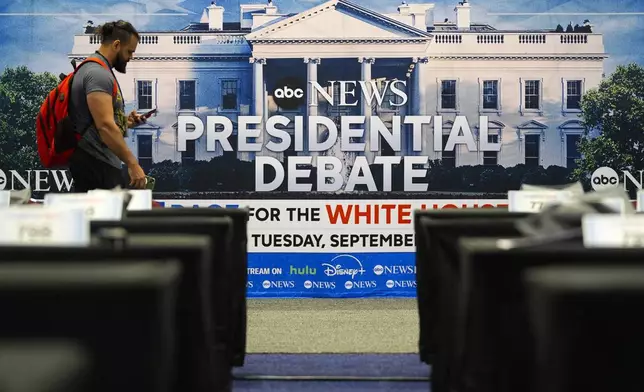 Signage at the media filing center ahead of tomorrow's presidential debate between Republican presidential candidate former President Donald Trump and Democratic presidential nominee Vice President Kamala Harris, Monday, Sept. 9, 2024, in Philadelphia. (AP Photo/Pablo Martinez Monsivais)