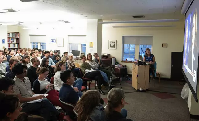 UC Berkeley students watch the presidential debate between Republican presidential nominee former President Donald Trump and Democratic presidential nominee Vice President Kamala Harris, Tuesday, Sept. 10, 2024, in Berkeley, Calif. (AP Photo/Godofredo A. Vásquez)