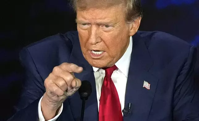 Republican presidential nominee former President Donald Trump speaks during a presidential debate with Democratic presidential nominee Vice President Kamala Harris at the National Constitution Center in Philadelphia, Tuesday, Sept. 10, 2024. (AP Photo/Alex Brandon)