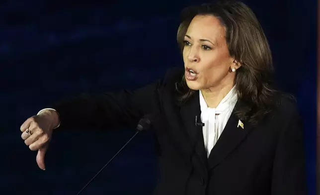 Democratic presidential nominee Vice President Kamala Harris gestures as she speaks during a presidential debate with Republican presidential nominee former President Donald Trump at the National Constitution Center in Philadelphia, Tuesday, Sept. 10, 2024. (AP Photo/Alex Brandon)