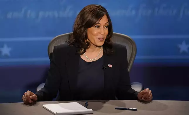 FILE - Democratic vice presidential candidate Sen. Kamala Harris, D-Calif., participates in the vice presidential debate with Vice President Mike Pence, Oct. 7, 2020, at Kingsbury Hall on the campus of the University of Utah in Salt Lake City. (AP Photo/Julio Cortez, File)