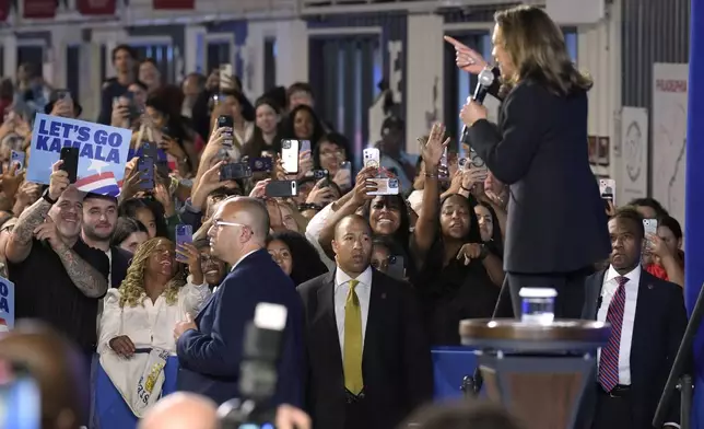 Supporters listen as Democratic presidential nominee Vice President Kamala Harris speaks at a watch party at Cherry Street Pier after the presidential debate in Philadelphia, Tuesday, Sept. 10, 2024. (AP Photo/Jacquelyn Martin)