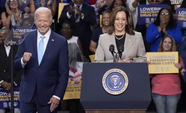 FILE - President Joe Biden, left, and Vice President Kamala Harris speak in Largo, Md., Aug. 15, 2024. (AP Photo/Stephanie Scarbrough, File)