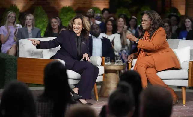 Democratic presidential nominee Vice President Kamala Harris joins Oprah Winfrey at Oprah's Unite for America Live Streaming event Thursday, Sept. 19, 2024 in Farmington Hills, Mich. (AP Photo/Paul Sancya)