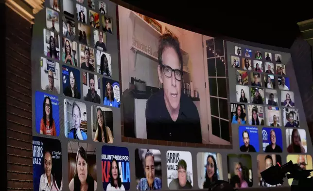 Actor Ben Stiller watches via video Oprah Winfrey speak before Democratic presidential nominee Vice President Kamala Harris joins her at Oprah's Unite for America Live Streaming event Thursday, Sept. 19, 2024 in Farmington Hills, Mich. (AP Photo/Paul Sancya)