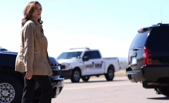 Democratic presidential nominee Vice President Kamala Harris walks after arriving in Douglas, Ariz., Friday, Sept. 27, 2024. (AP Photo/Carolyn Kaster)