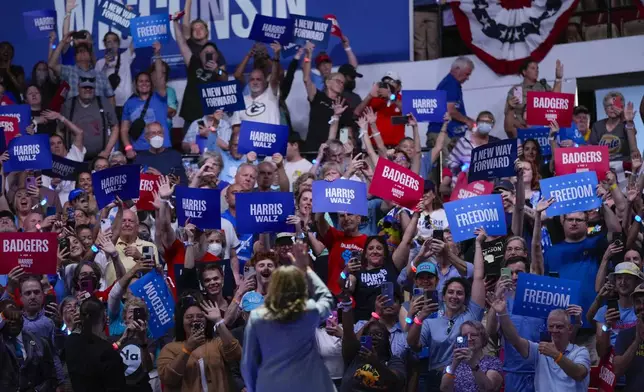 Democratic presidential nominee Vice President Kamala Harris waves to supporters during a rally, Friday, Sept. 20, 2024, in Madison, Wis. (AP Photo/Charlie Neibergall)