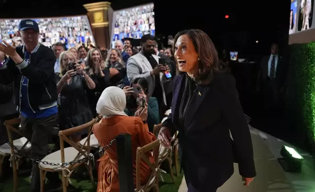 Democratic presidential nominee Vice President Kamala Harris arrives to join Oprah Winfrey at Oprah's Unite for America Live Streaming event Thursday, Sept. 19, 2024 in Farmington Hills, Mich. (AP Photo/Paul Sancya)