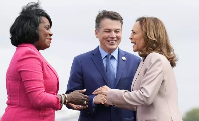 Democratic presidential nominee Vice President Kamala Harris, right, is greeted by Philadelphia Mayor Cherelle Lesley Parker, left, and Rep. Brendan Boyle, D-PA., center, on the tarmac at Atlantic Aviation Philadelphia, Monday, Sept. 9, 2024, near Philadelphia International Airport, in Philadelphia, Tuesday, Sept. 17, 2024. (AP Photo/Jacquelyn Martin)