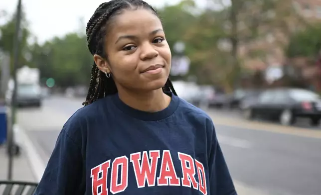 Howard University student Nikkya Taliaferro poses for a portrait across the street from her school, Friday, Aug. 30, 2024 in Washington. (AP Photo/John McDonnell)