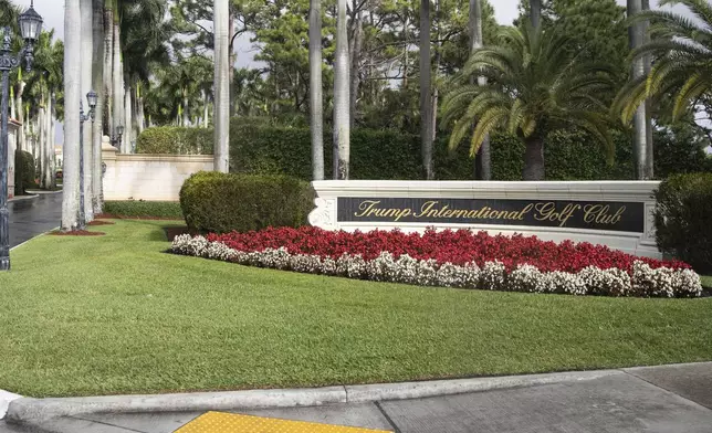 FILE - The motorcade for President Donald Trump arrives at Trump International Golf Club, Feb. 15, 2020, in West Palm Beach, Fla. (AP Photo/Alex Brandon, File)